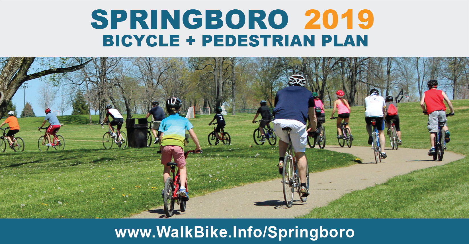 people riding bikes on a path