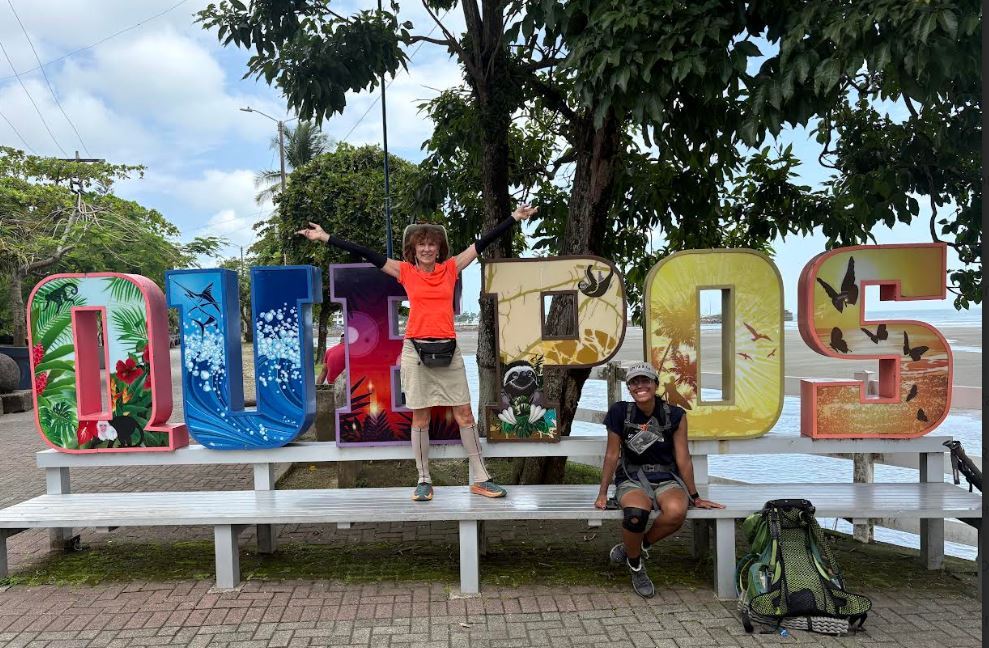 karen power in front of sign